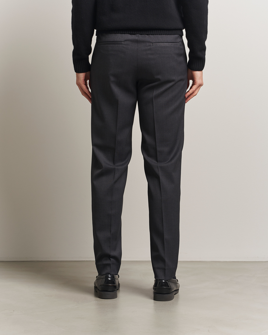 Uomini | Pantaloni | Filippa K | Theo Relaxed Wool Trousers Mid Grey