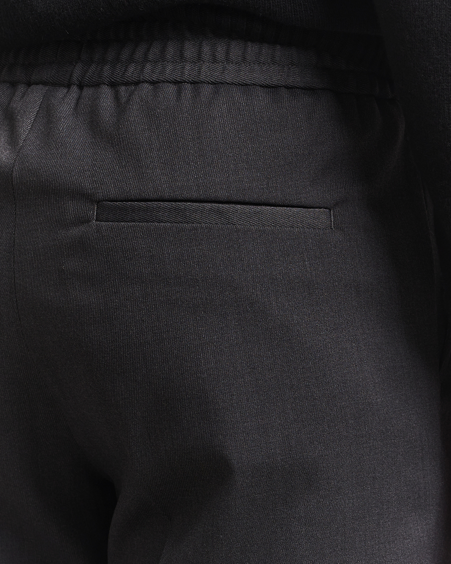 Uomini | Pantaloni | Filippa K | Theo Relaxed Wool Trousers Mid Grey