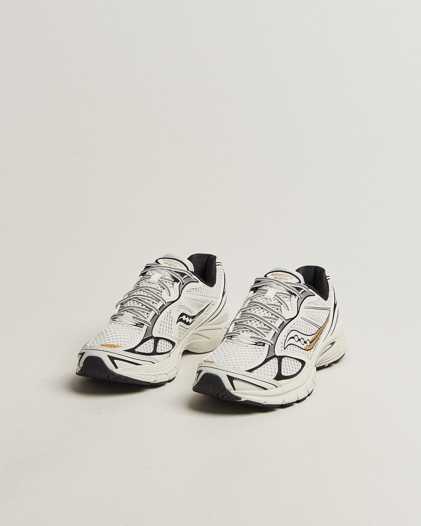 Uomini | Sneakers | Saucony | Guide 7 Running Sneaker Onyx/Gold