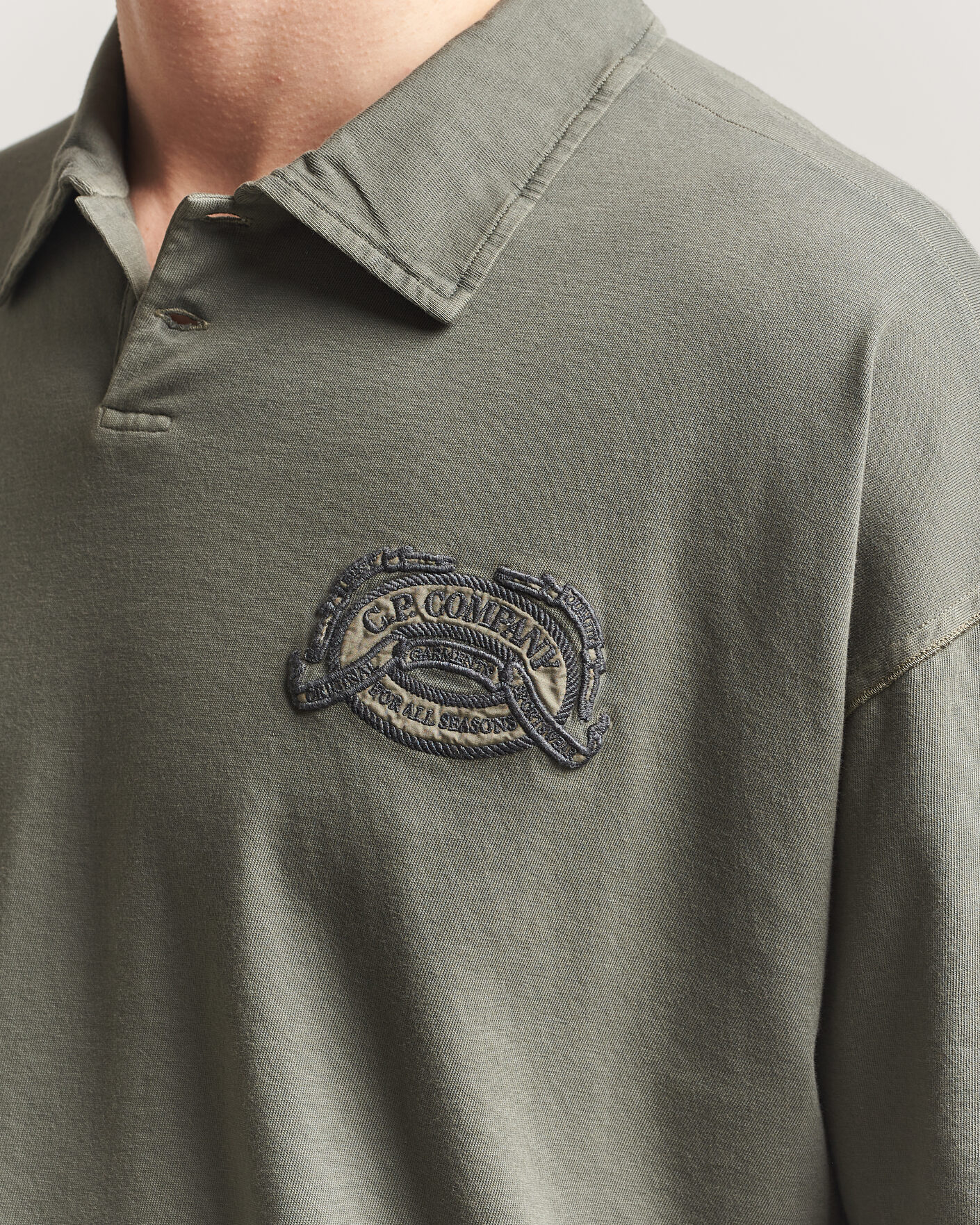 Uomini | Polo | C.P. Company | Boxy Fit Cotton Logo Polo Dark Green