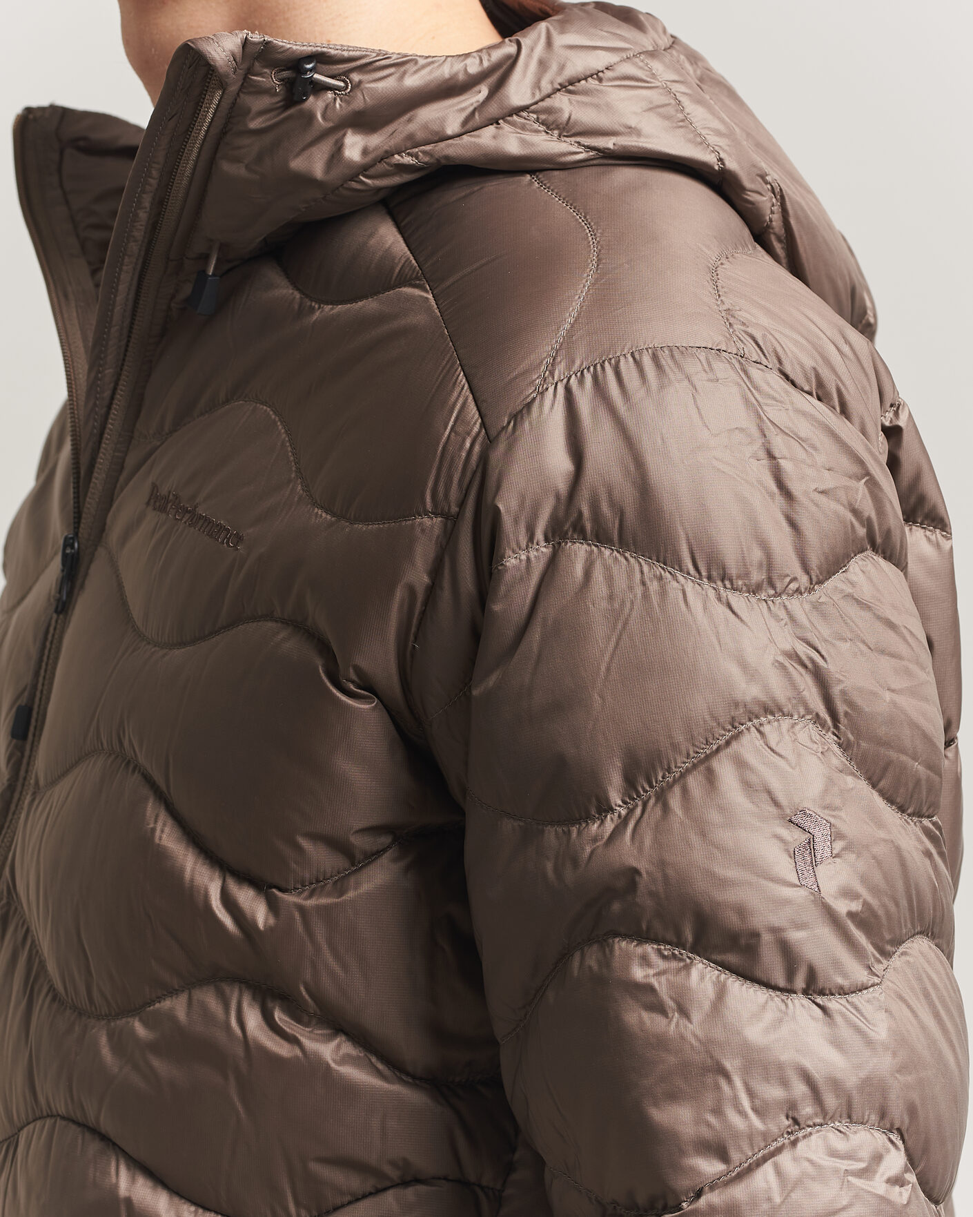 Uomini | Giacche | Peak Performance | Helium Down Hooded Jacket Terrian Tan