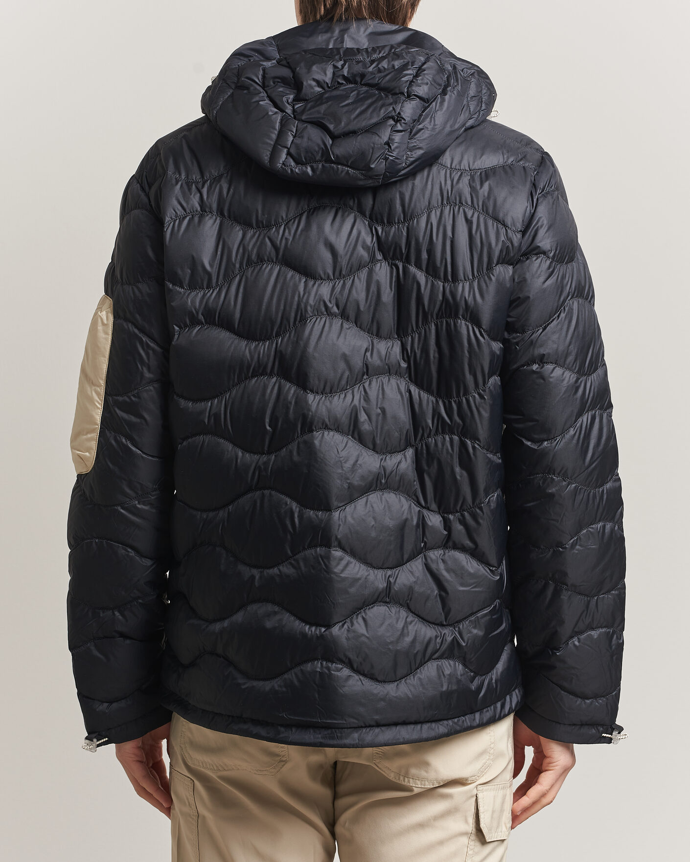 Uomini | Giacche | Peak Performance | Helium Utility Down Hooded Jacket Black/Sand Fog