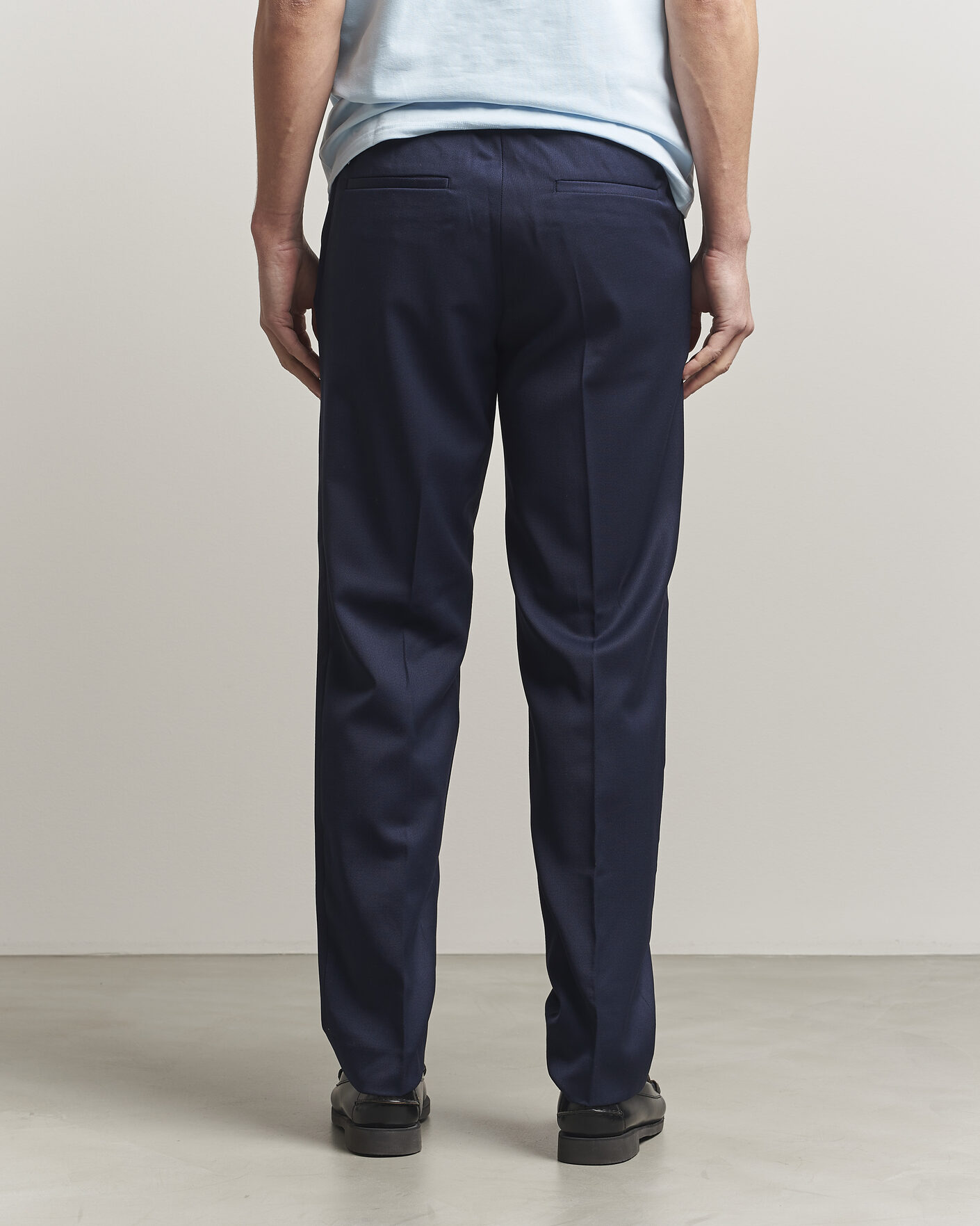 Uomini | Pantaloni | Filippa K | Theo Relaxed Wool Trousers Ink Navy