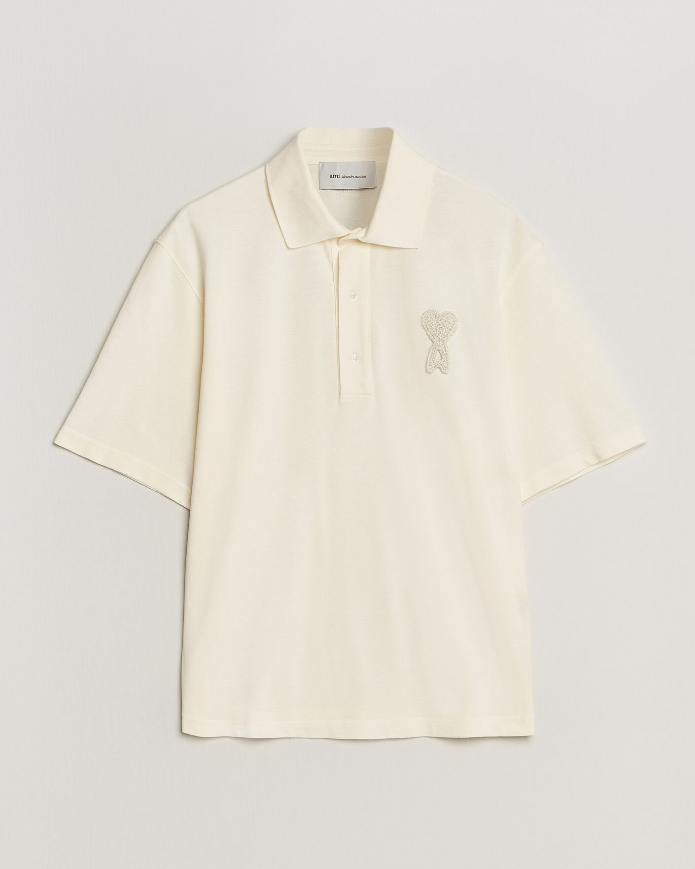 Uomini | Polo | AMI | Knitted Heart Logo Polo Creme