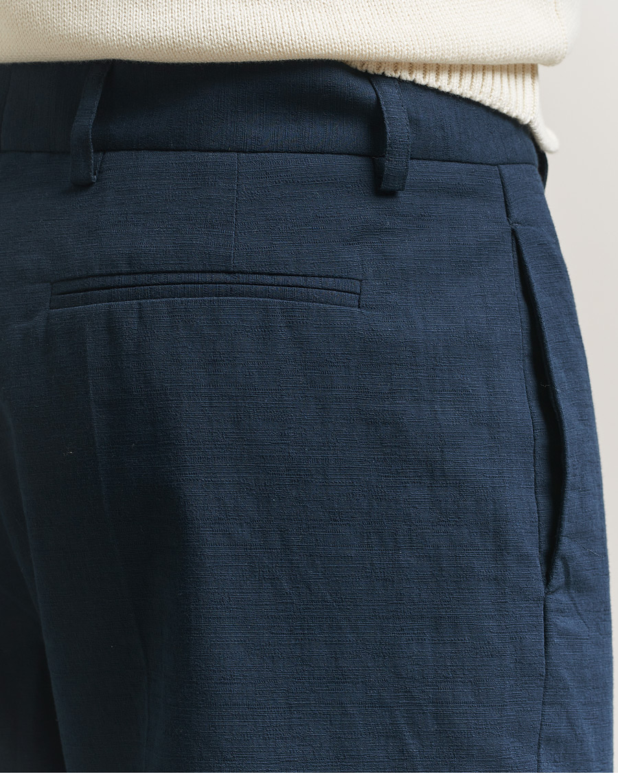 Uomini | Pantaloni | Palmes | Pleated Cotton Trousers Navy
