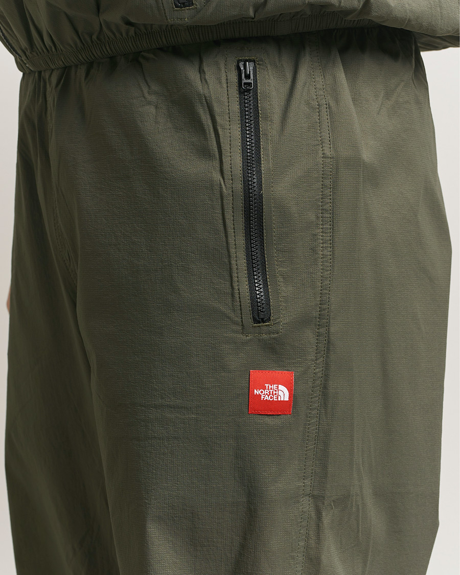 Uomini | Pantaloni | The North Face | Red Box Packable Wind Pants New Taupe Green