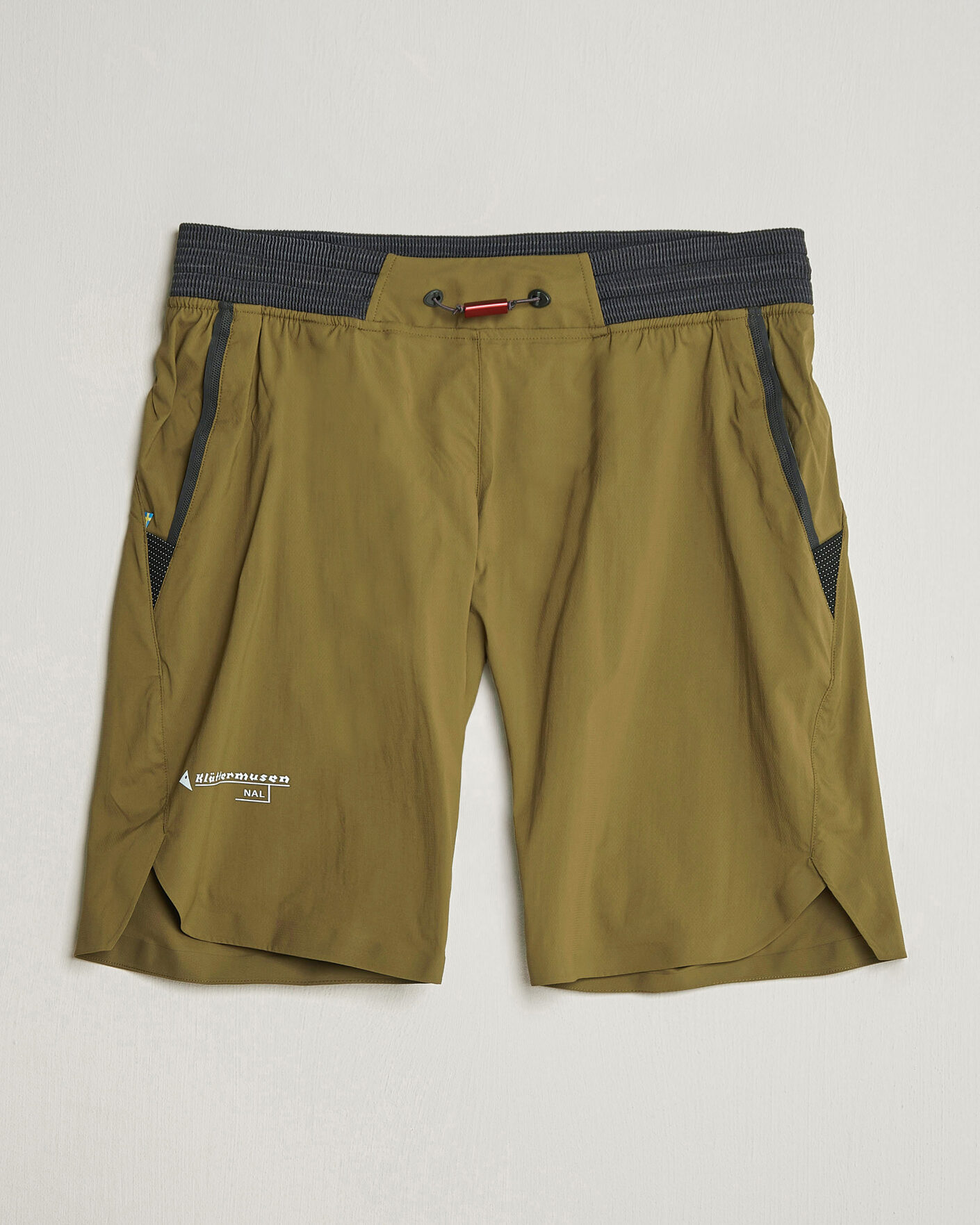 Uomini | Pantaloncini | Klättermusen | Nal Windbreaker Shorts Olive