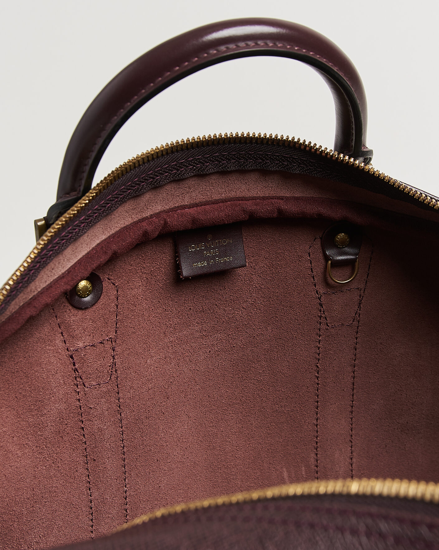 Uomini | Pre-Owned & Vintage Bags | Louis Vuitton Pre-Owned | Taiga Kendall Weekend Bag PM Burgundy