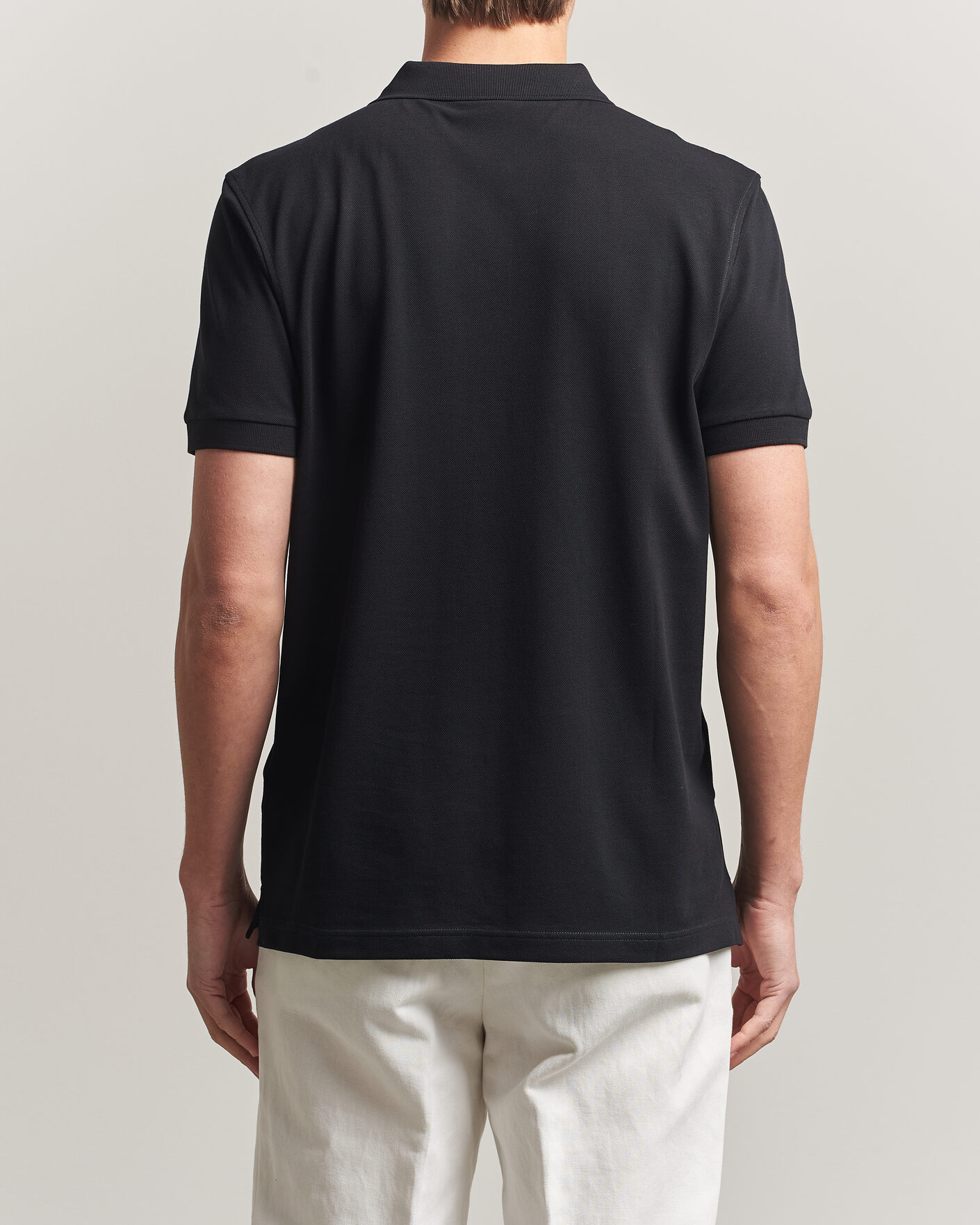 Uomini | Polo | Sunspel | Short Sleeve Pique Polo Black