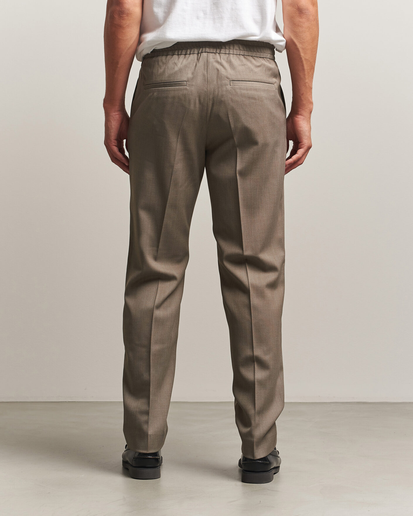 Uomini | Pantaloni | Filippa K | Theo Relaxed Wool Trousers Stone Taupe