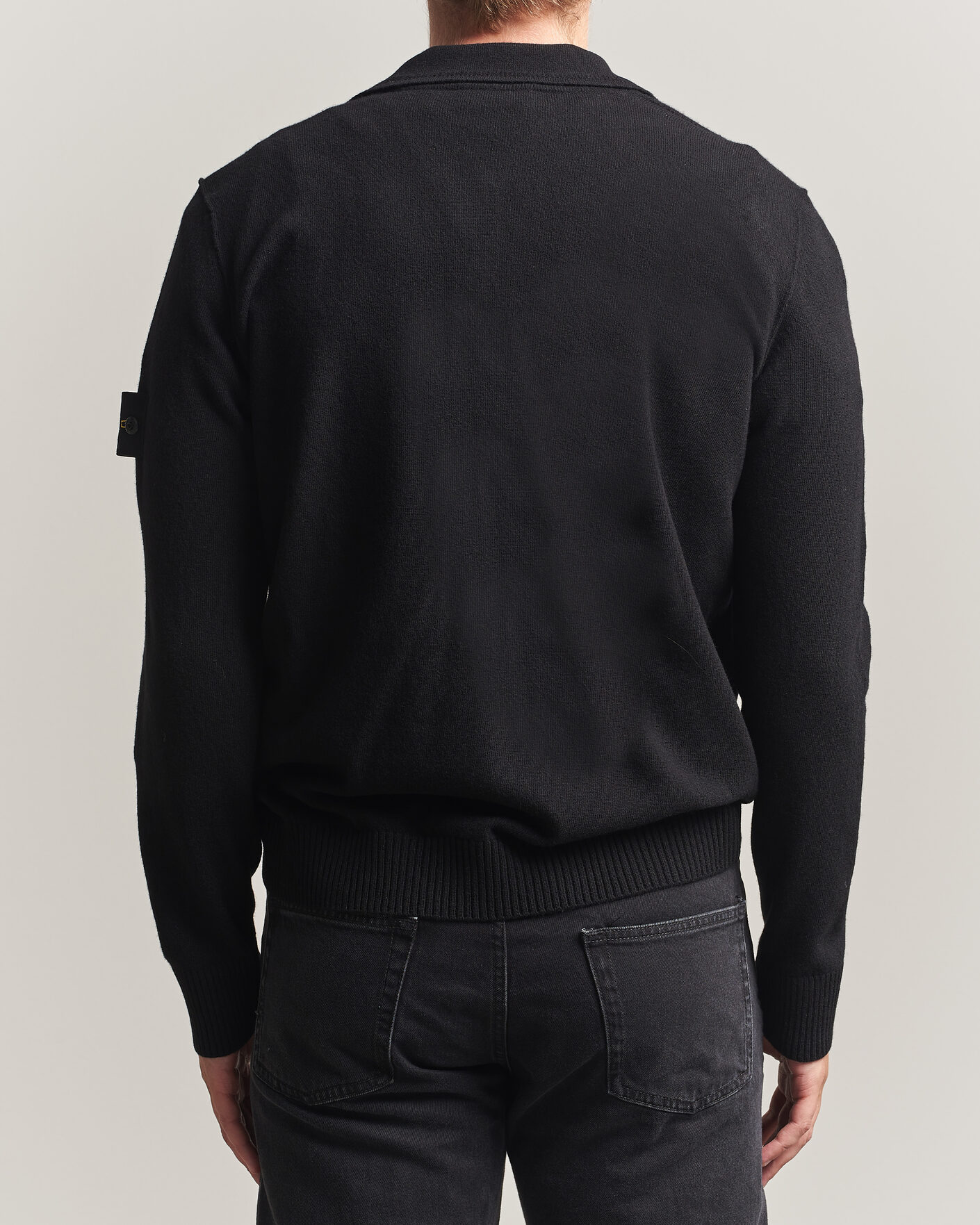 Uomini | Maglieria | Stone Island | Knitted Geelong Wool Polo Black