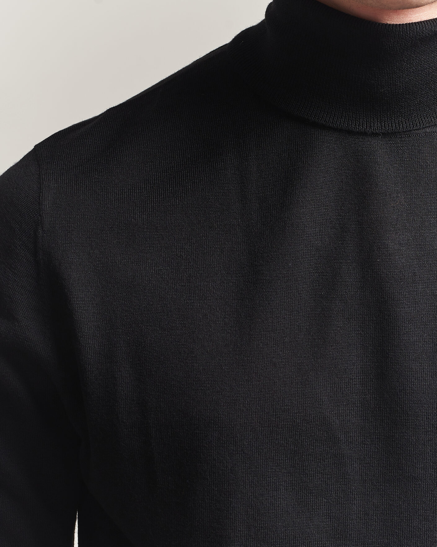 Uomini | Maglieria | Tiger of Sweden | Nevile Extra Fine Merino Polo Black