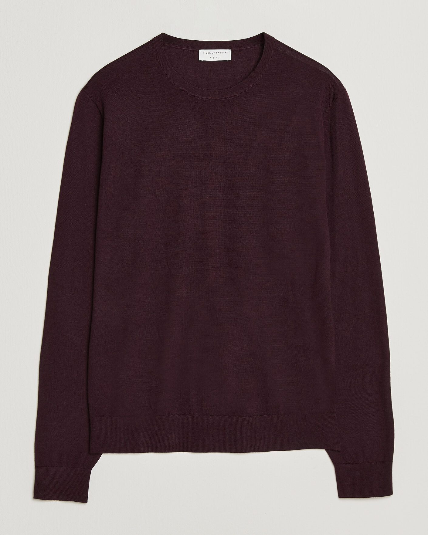 Uomini | Maglieria | Tiger of Sweden | Connor Extra Fine Merino Crew Neck Pullover Aubergine