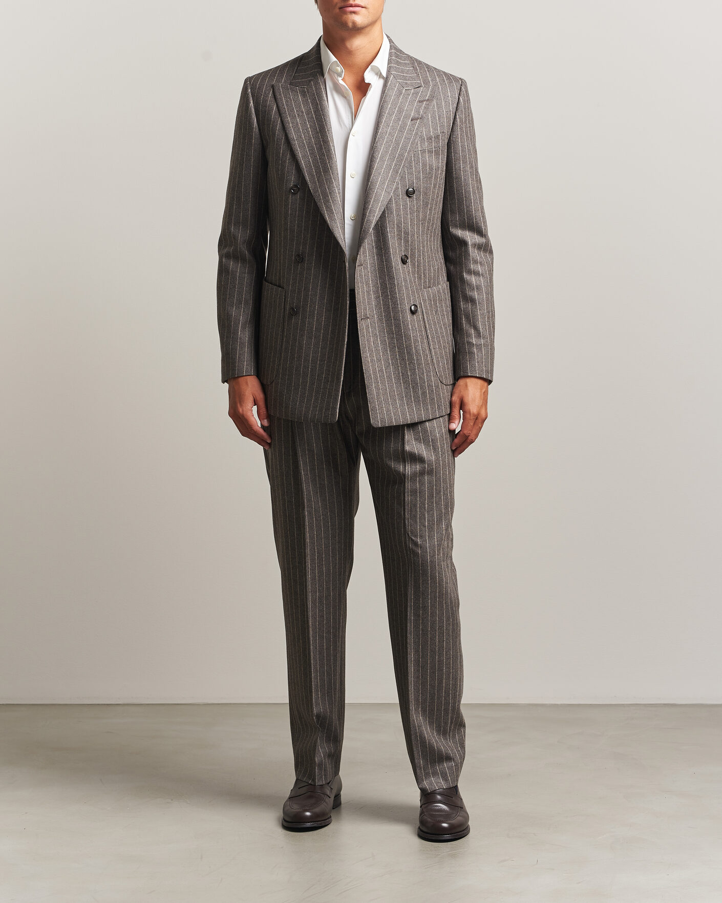 Uomini | Pantaloni | Tiger of Sweden | Theo Wool Pleated Pinstriped Trousers Grey Brown