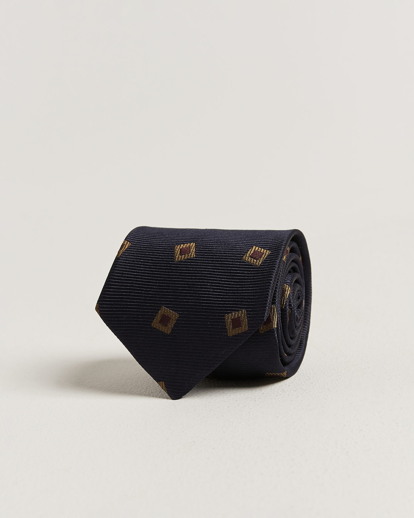 Uomini | Cravatte | Drake's | Diamond Motif Silk Tie Navy/Gold/Red