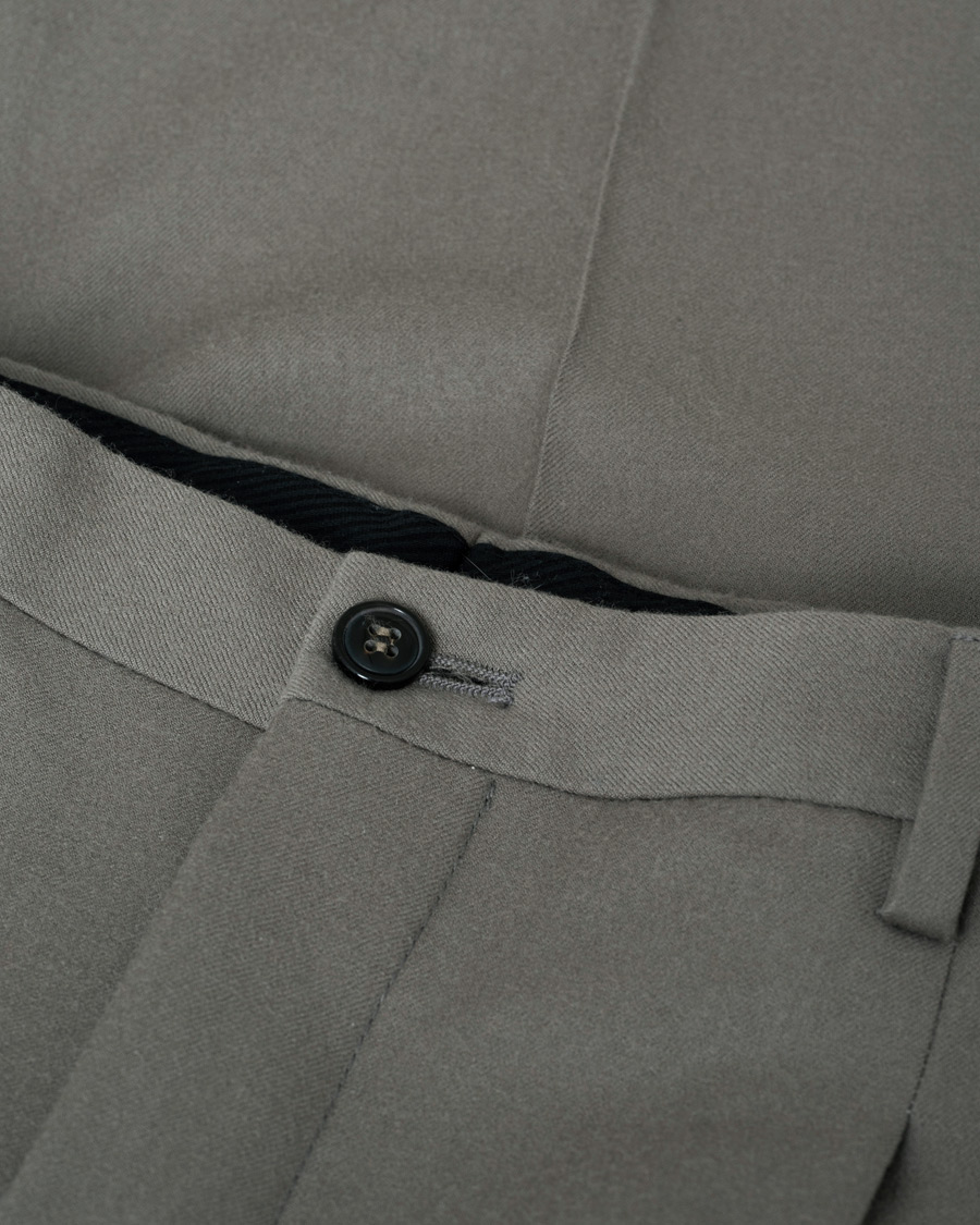 Uomini | Pantaloni | Pre-owned | Giorgio Armani Tapered Wool Flannel Trousers Light Grey