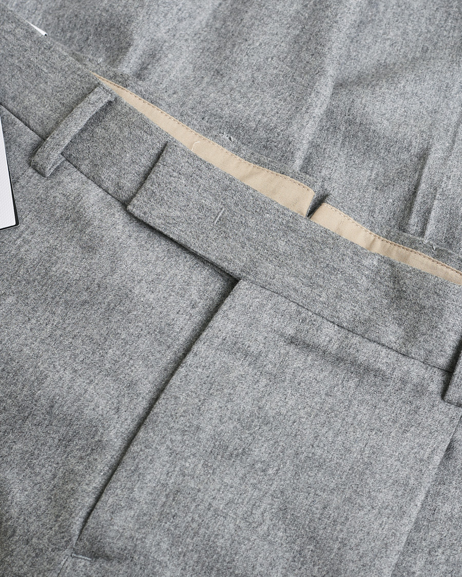 Uomini | PT01 Pleated Wool Trousers Grey Melange 50 | Pre-owned | PT01 Pleated Wool Trousers Grey Melange 50