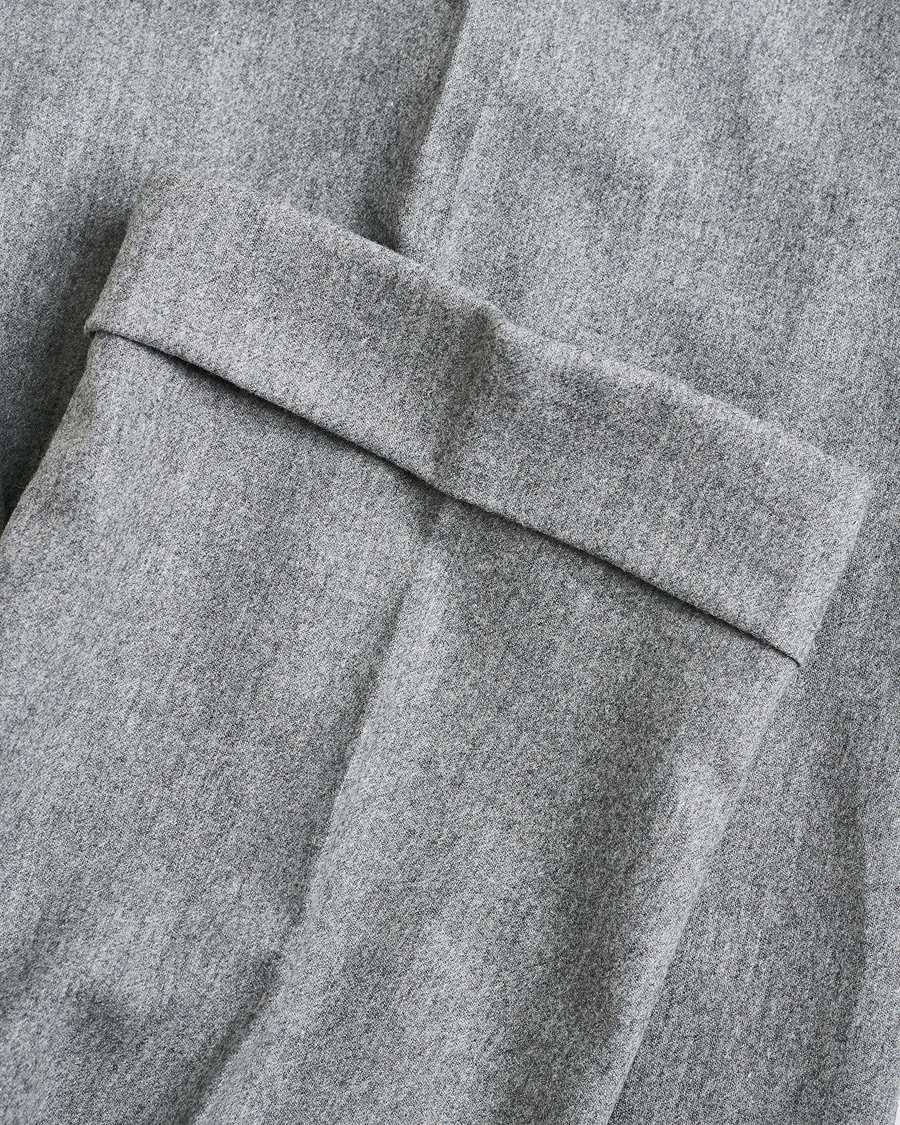 Uomini | PT01 Pleated Wool Trousers Grey Melange 50 | Pre-owned | PT01 Pleated Wool Trousers Grey Melange 50